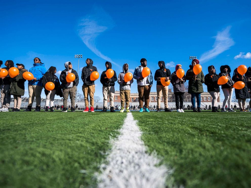 PHOTO: Eastern High School students walk out of class and assemble on their football field for the National School Walkout, a nation-wide protest against gun violence, in Washington, March 14, 2018.