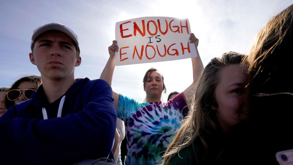 PHOTO: Columbine High School student Leah Zunder holds a sign during a National School Walkout to honor the 17 students and staff members killed at Marjory Stoneman Douglas High School in Parkland, Fla., in Littleton, Colo., on March 14, 2018.