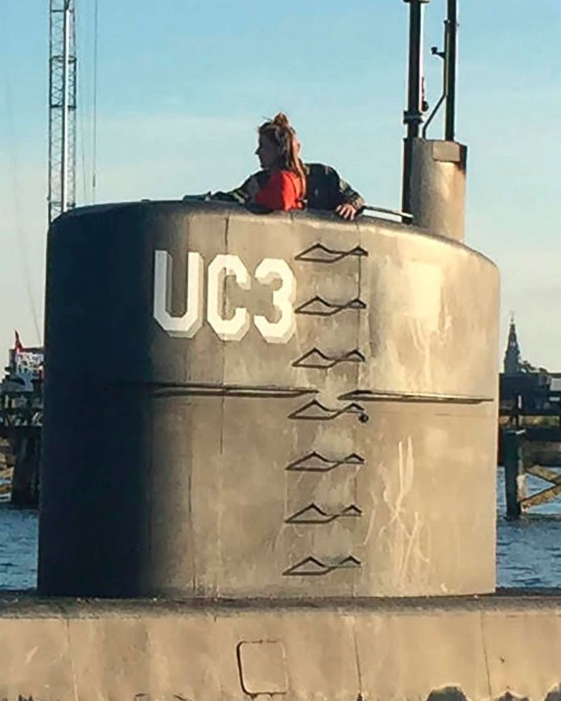 PHOTO: Swedish journalist Kim Wall is seen standing in the tower of the private submarine "UC3 Nautilus" in Copenhagen Harbor.