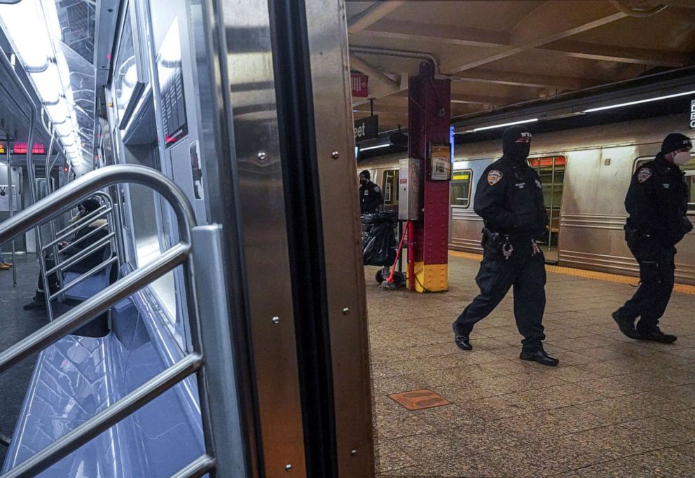 PHOTO: Police patrol the A line subway train bound to Inwood, after NYPD deployed additional officers into the subway system following deadly attacks, Feb. 13, 2021, in New York.