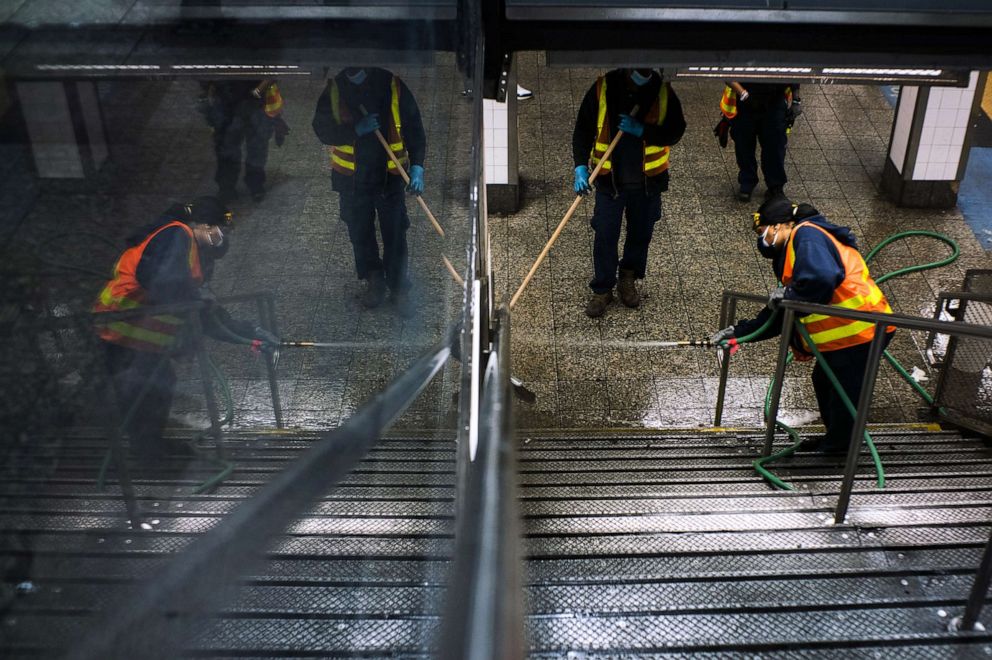 PHOTO: Workers clean Grand Central station as the New York City subway system, the largest public transportation system in the nation is set for nightly cleaning due to the continued spread of the coronavirus, May 6, 2020 in New York City.