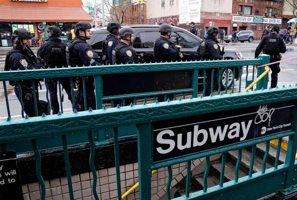 PHOTO: Members of the New York Police Department patrol the streets after at least 13 people were injured during a rush-hour shooting at a subway station in the New York borough of Brooklyn, April 12, 2022.