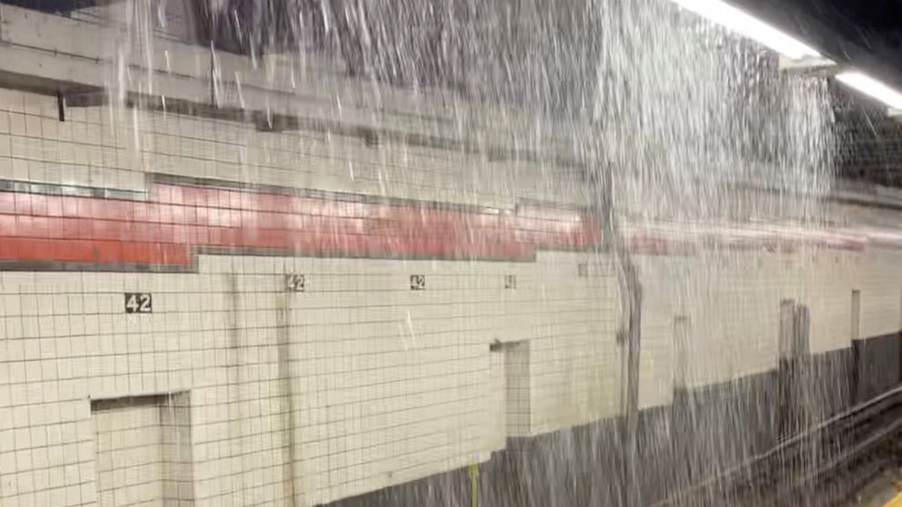 PHOTO: Heavy rain falls on a subway platform on 42nd street in New York City, July 8, 2021.