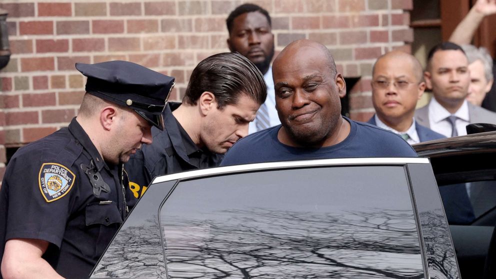 PHOTO: Frank James, the suspect in the Brooklyn subway shooting, reacts as he is escorted to a vehicle after leaving an NYPD precinct in New York, April 13, 2022.