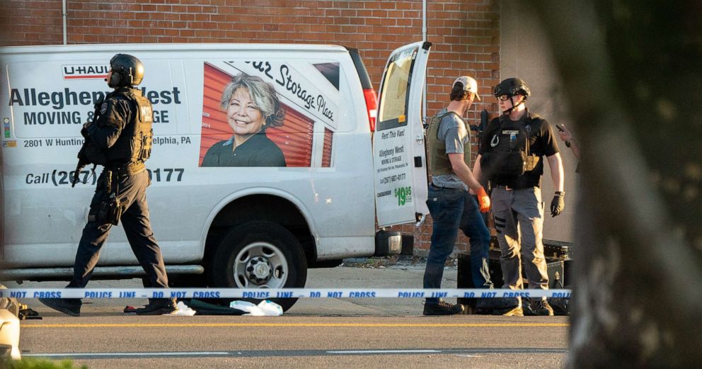 PHOTO: Members of the NYPD bomb squad inspect a U-Haul van believed to be linked to the suspect of a shooting earlier today in the subway in New York, April 12, 2022.