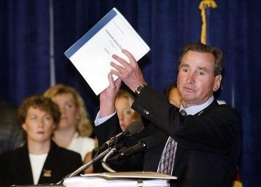 PHOTO: In this file photo, lawyer Ron Motley holds a copy of a lawsuit he is filing against financial backers of terrorists on behalf of September  11 victims and their families in Washington, Aug. 15, 2002. 