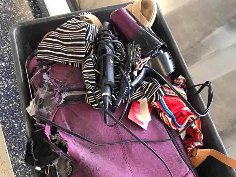 PHOTO: The remnants of Kristen Horabins checked suitcase after American Airlines flight is seen here.