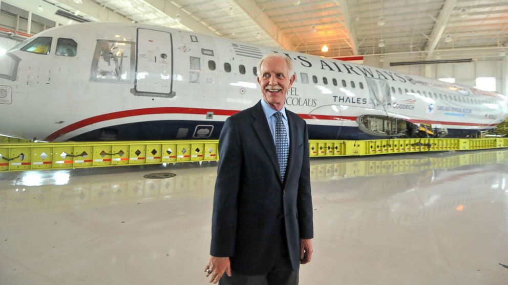 PHOTO: Capt. Chesley Sullenberger, stands in front of the US Airways flight 1549 fuselage at the Carolinas Aviation Museum, June 11, 2011. 