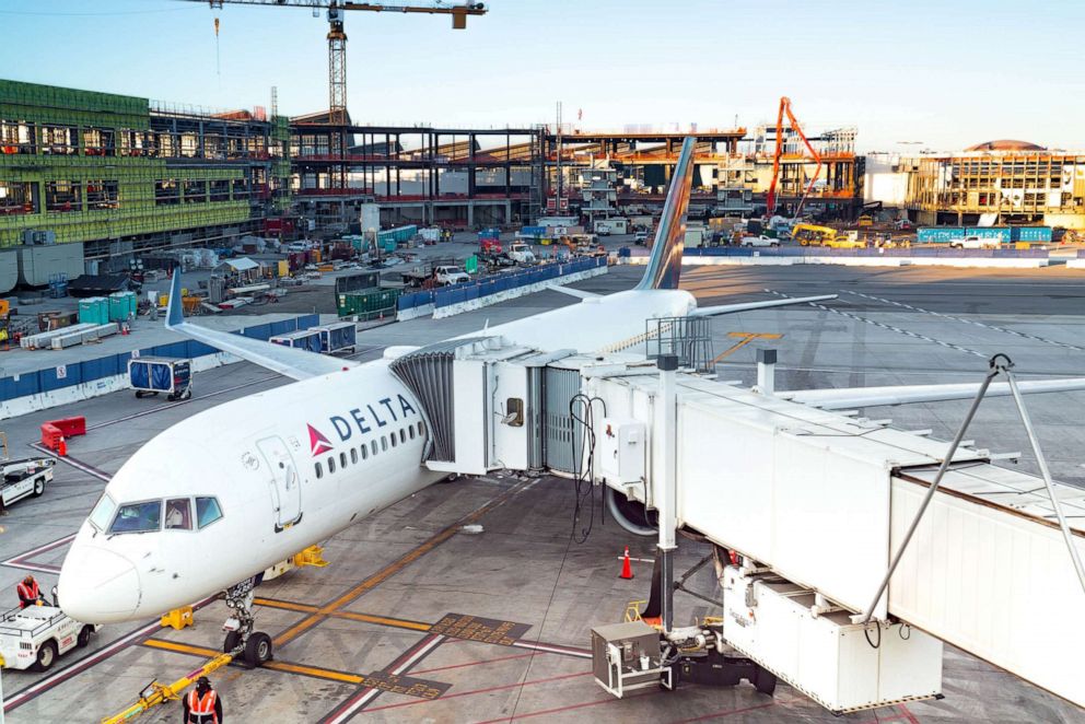 PHOTO: Delta Airlines flight prepares for boarding at Los Angeles International Airport on December 31, 2020.