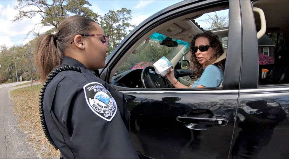 PHOTO: Summerville, S.C. police officers handed out toilet paper to drivers.