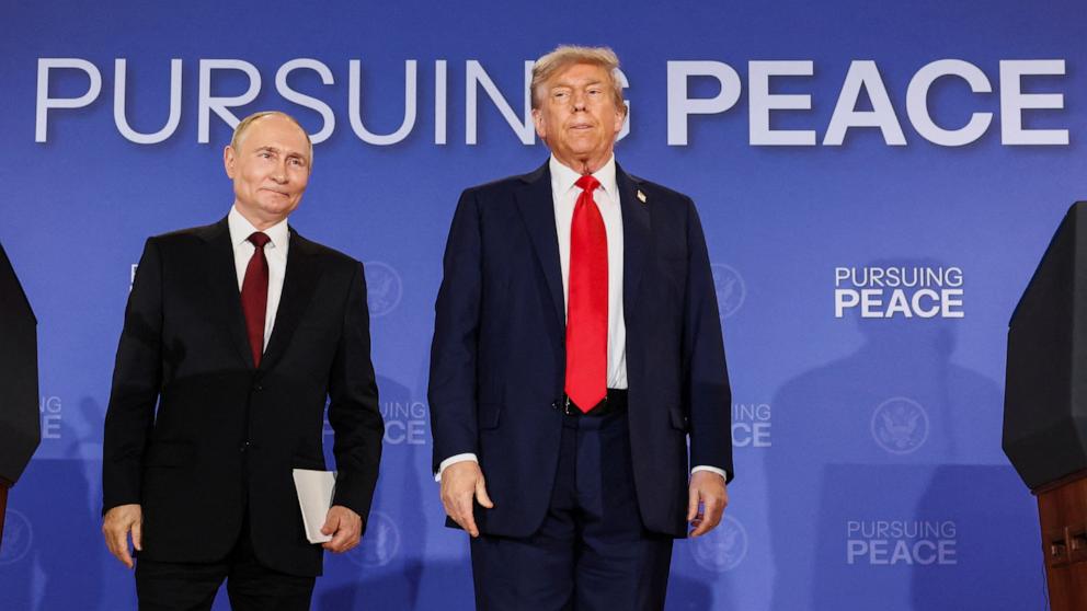 PHOTO: President Donald Trump and Russian President Vladimir Putin attend a press conference following their meeting to negotiate an end to the war in Ukraine, at Joint Base Elmendorf-Richardson, in Anchorage, Alaska, August 15, 2025. 