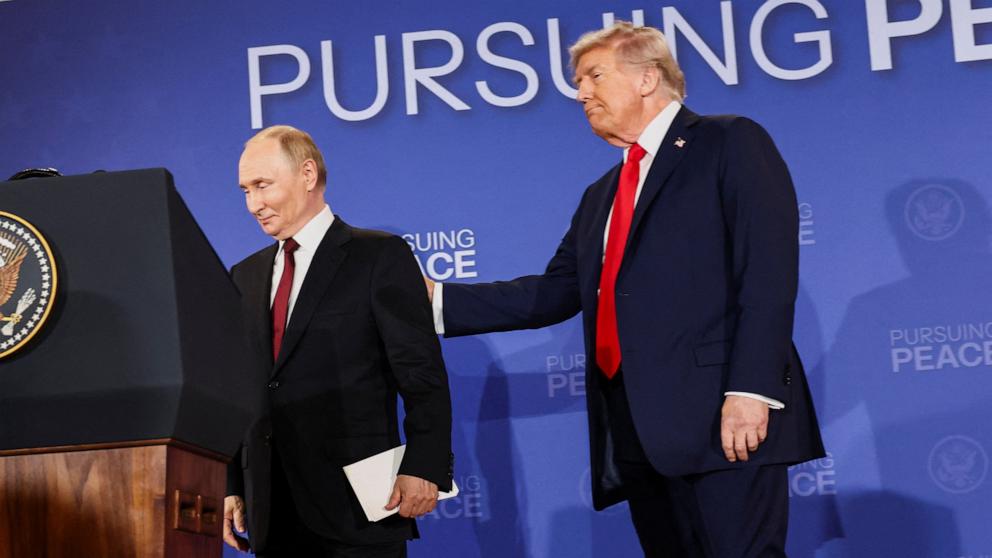 PHOTO: President Donald Trump and Russian President Vladimir Putin leave the stage folowing a press conference following their meeting to negotiate an end to the war in Ukraine, at Joint Base Elmendorf-Richardson, in Anchorage, Alaska,  August 15, 2025.