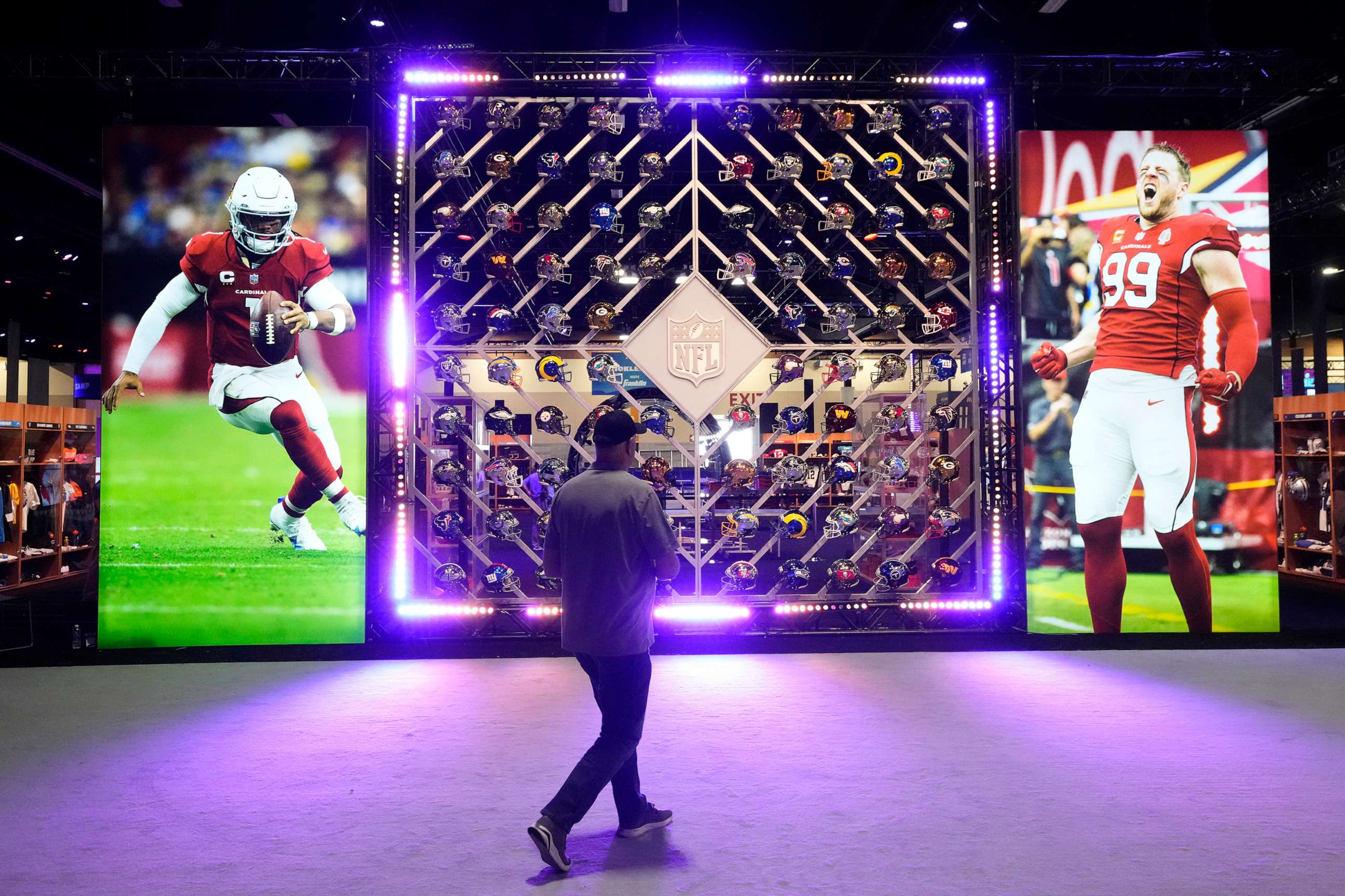 PHOTO: A man walks by during an early look at the main entrance at the Super Bowl Experience leading up to the NFL Super Bowl LVII football game in Phoenix, on Feb. 3, 2023.