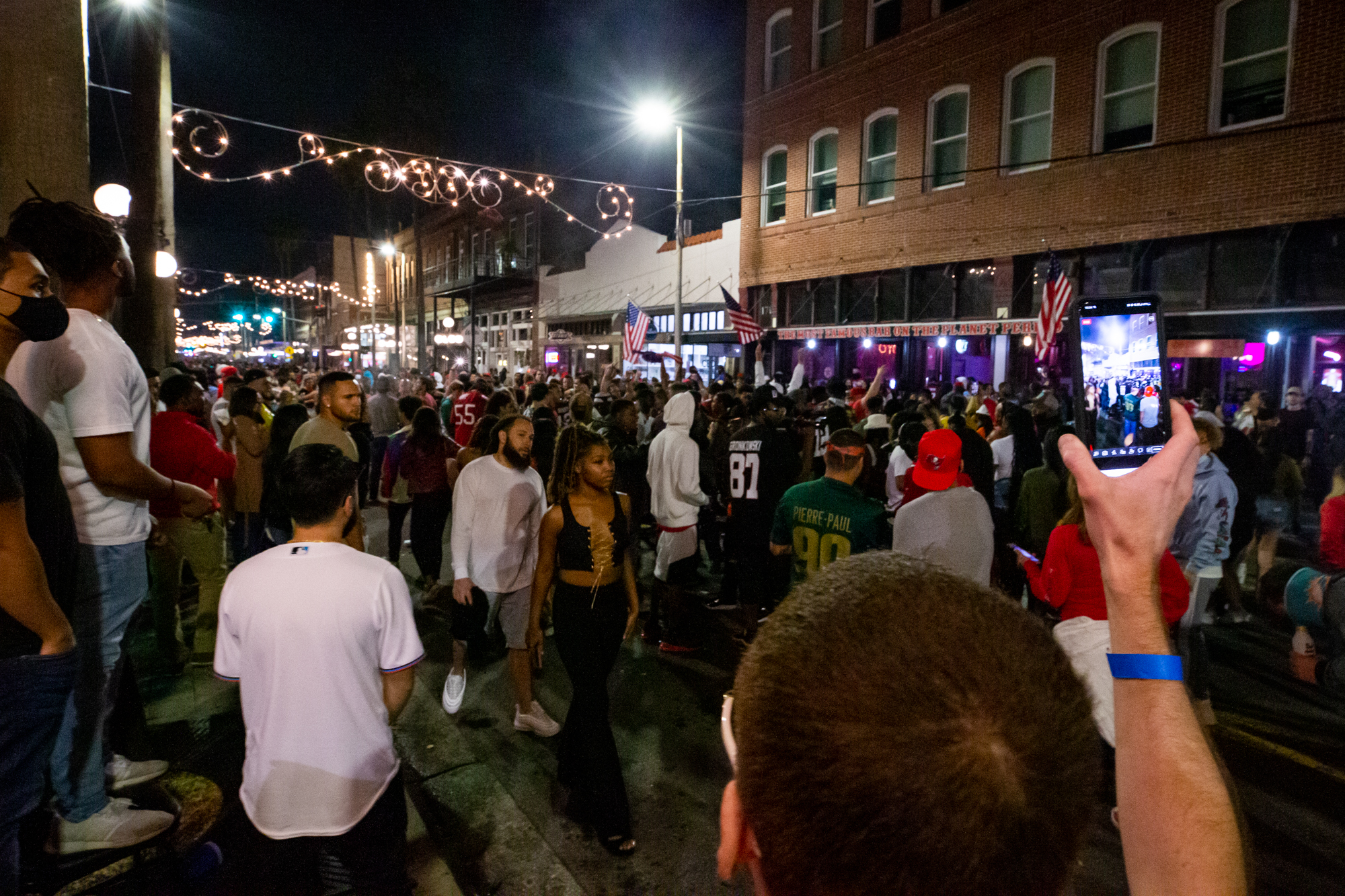 PHOTO: Fans celebrate in the streets of Ybor City in Tampa, Fla., after the Tampa Bay Buccaneers beat the Kansas City Chiefs in Super Bowl LV, Feb. 7, 2021.