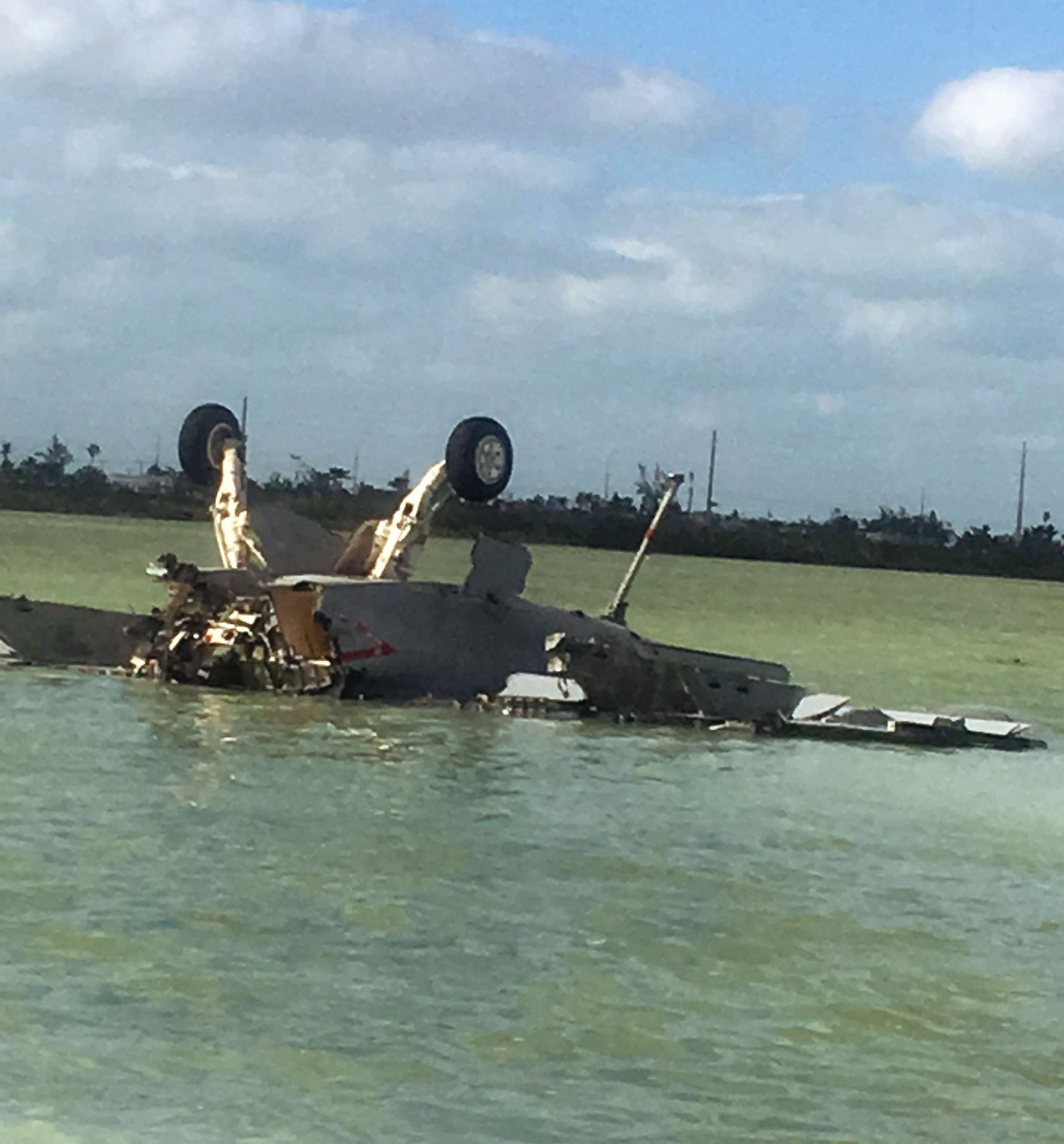 PHOTO: An image made from eyewitness video shows the remains of a Navy F/A-18 Super Hornet that crashed near Boca Chica Field, Naval Air Station, Key West, Fla., on March 14, 2018.