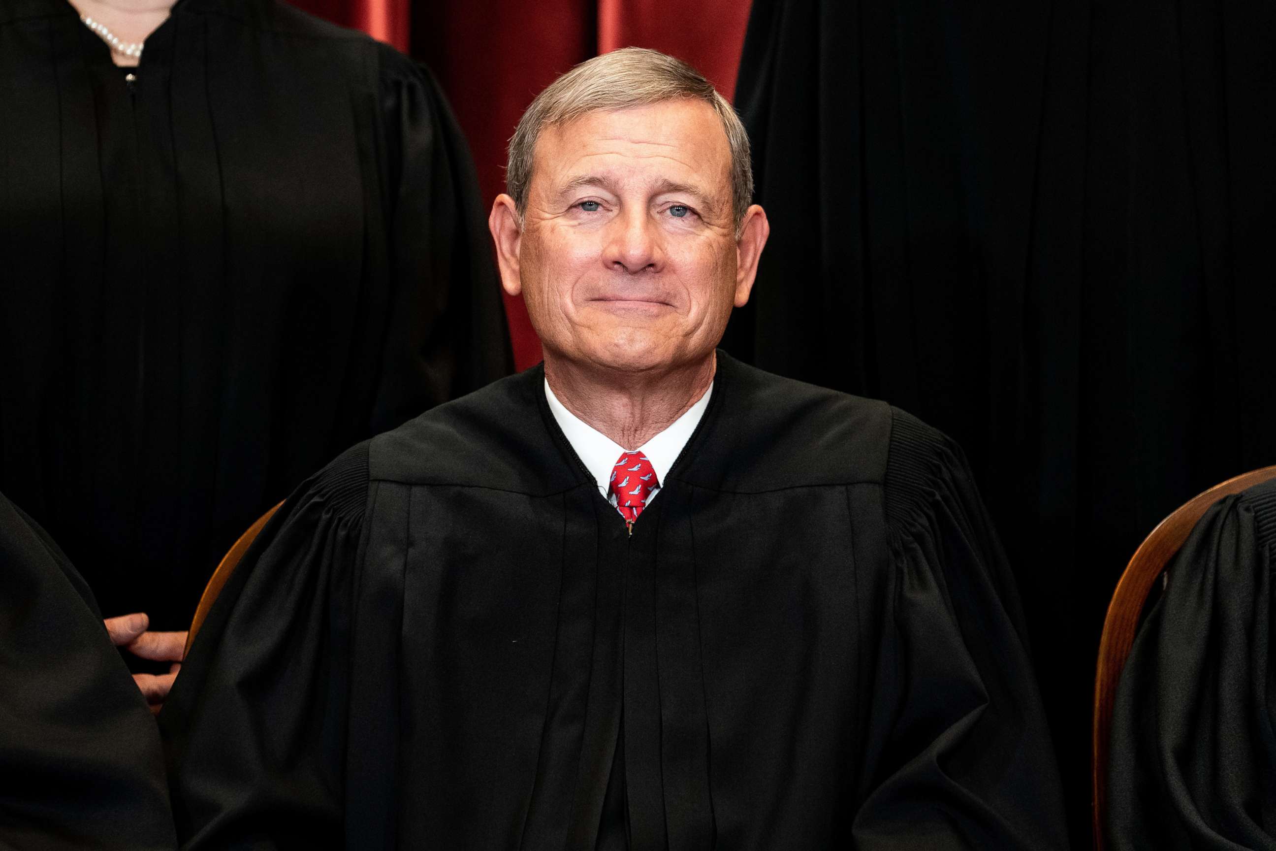 PHOTO: In this April 23 2021, file photo, Chief Justice John Roberts sits during a group photo of the Justices at the Supreme Court in Washington, D.C.