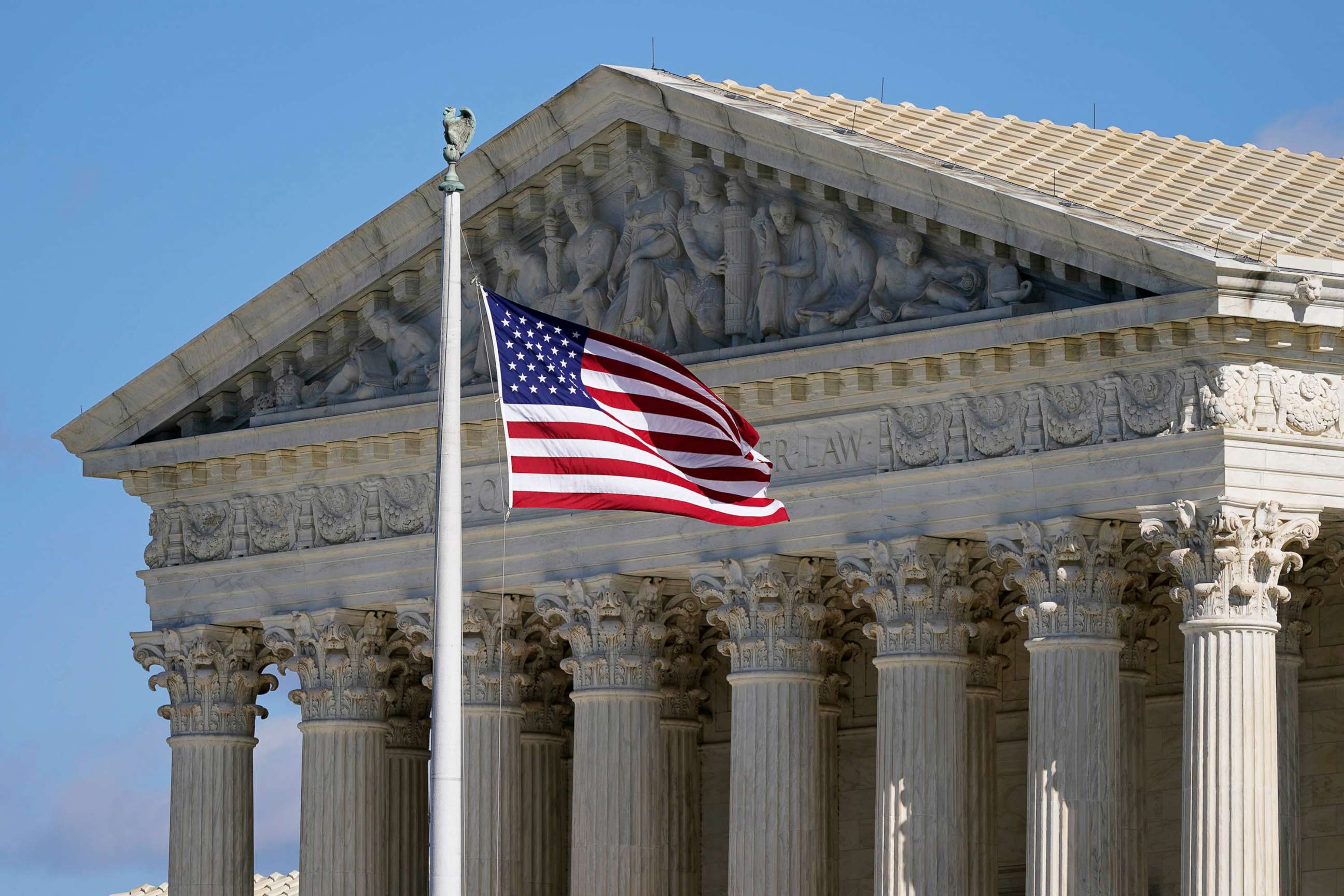 PHOTO: An American flag waves in front of the Supreme Court building on Capitol Hill in Washington, Nov. 2, 2020. 