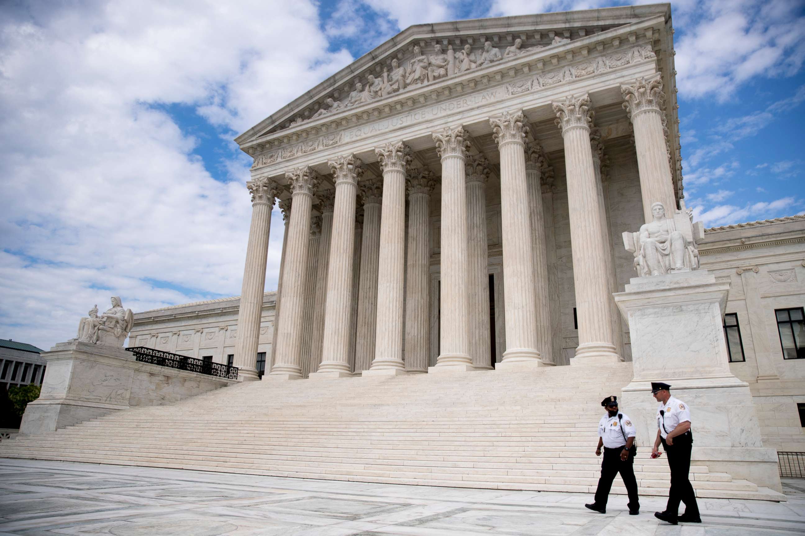 PHOTO: Security officers walk in front of the Supreme Court in Washington, May 14, 2020.