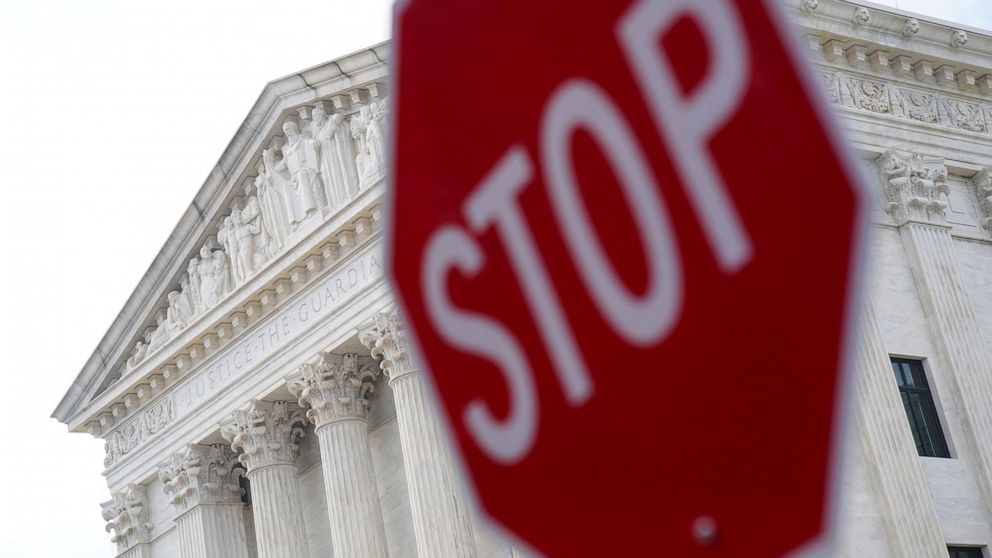 PHOTO: The exterior of the U.S. Supreme Court building is seen after justices allowed abortion providers to pursue a legal challenge to a ban on most abortions in Texas, on Capitol Hill, Dec. 10, 2021. 