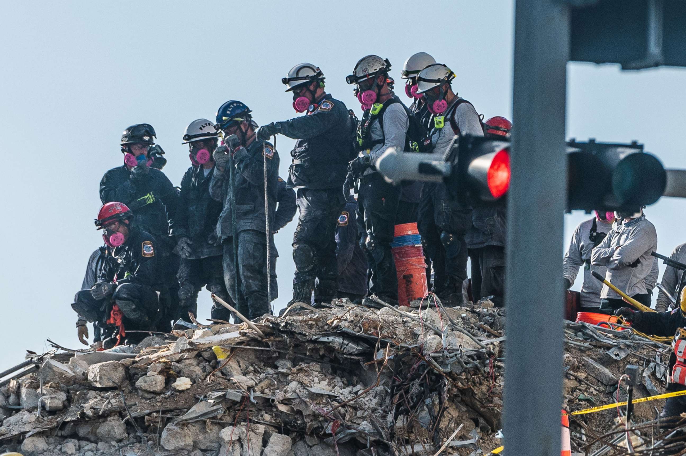 PHOTO: Search and Rescue teams look for possible survivors in the partially collapsed 12-story Champlain Towers South condo building, June 28, 2021, in Surfside, Fla. 