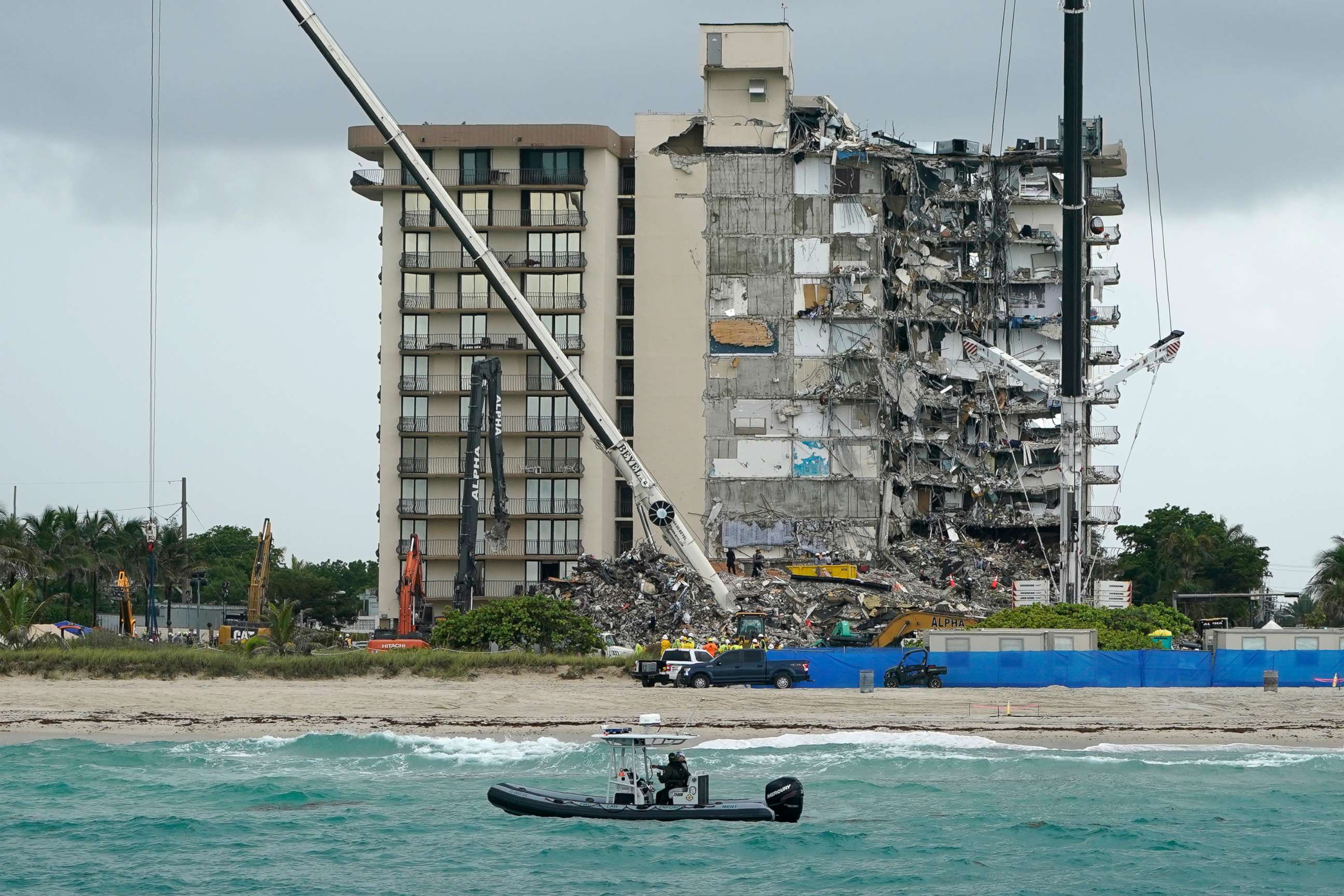 PHOTO: A Florida Fish and Wildlife Conservation law enforcement boat patrols the oceanfront as search and rescue efforts continue at the Champlain Towers South condo building, June 30, 2021, in Surfside, Fla., near Miami Beach.