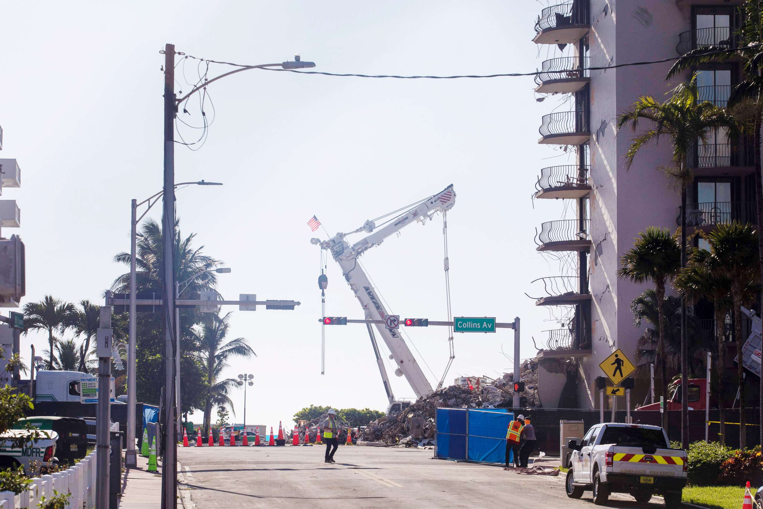 PHOTO: A construction crane stands outside the 12-story Champlain Towers South condo building that partially collapsed in Surfside, Fla.. July 4, 2021. 