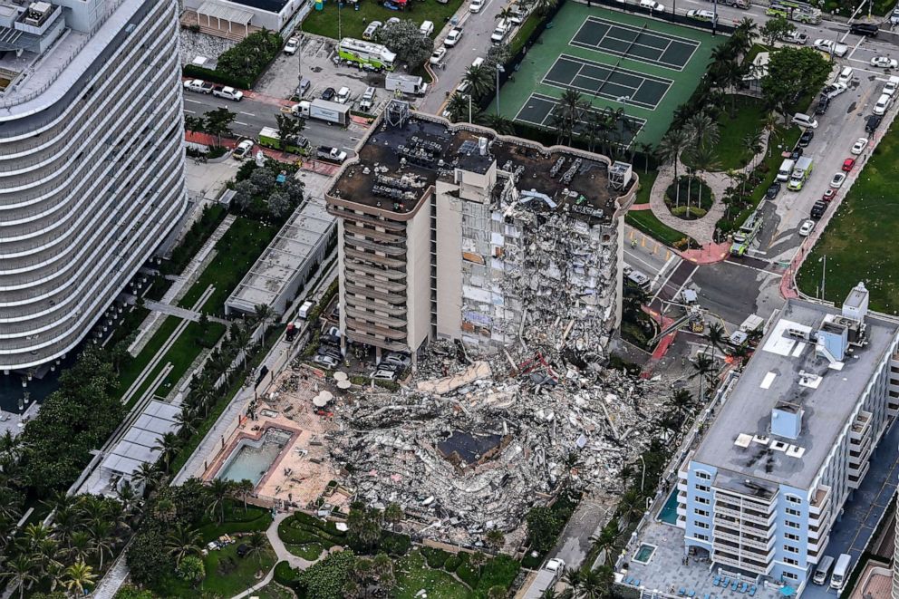 PHOTO: Search and rescue personnel work on site of the partial collapse of the Champlain Towers South in Surfside, north of Miami Beach, June 24, 2021.