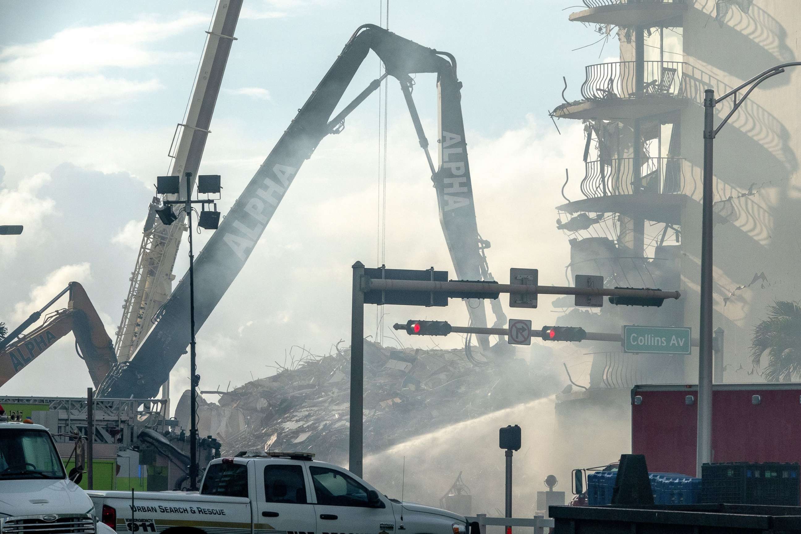 PHOTO: The Miami-Dade Rescue team searches in the partially collapsed 12-story condominium building in Surfside, Fla., June 26, 2021.