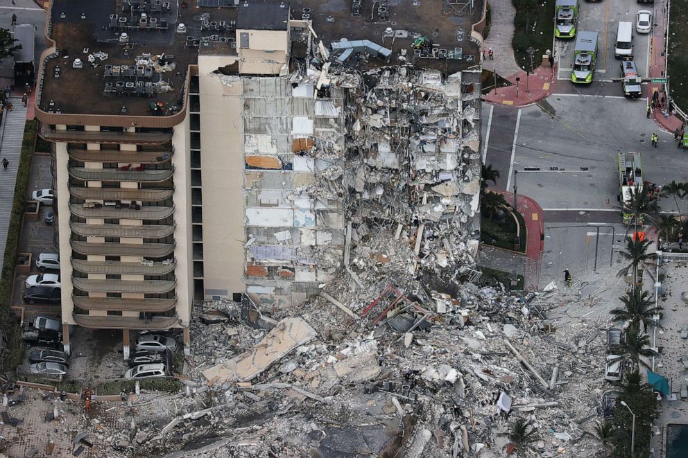 PHOTO: Search and Rescue personnel work after the partial collapse of the 12-story Champlain Towers South condo building in Surfside, Fla., June 24, 2021.