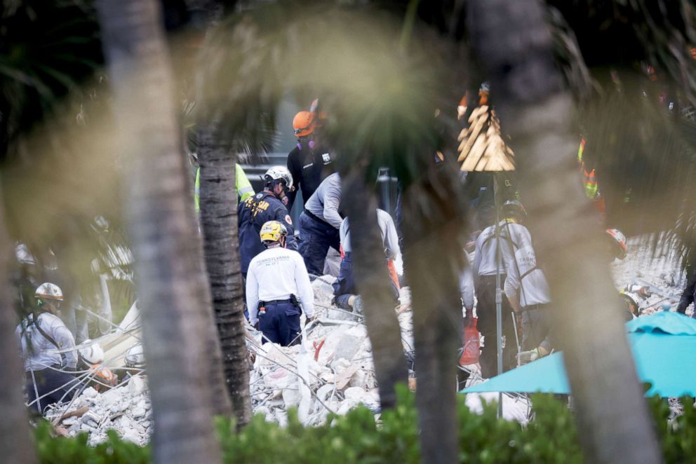 PHOTO: Rescue personnel continue search and rescue operation at the site of a partially collapsed residential building in Surfside, Fla., July 2, 2021.
