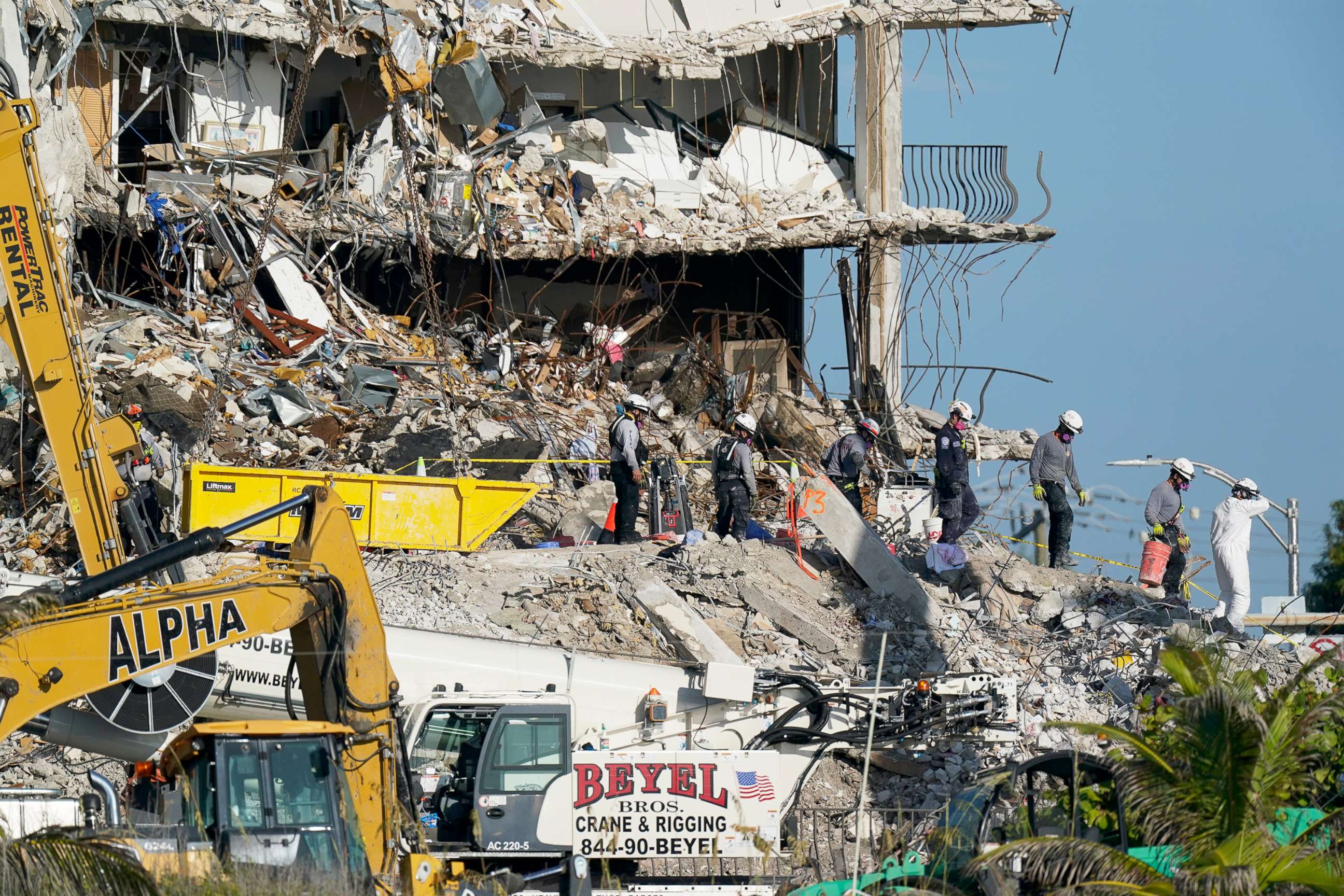 PHOTO: Search and rescue personnel work atop the rubble at the Champlain Towers South condo building, where scores of people remain missing more than a week after it partially collapsed in Surfside, Fla., July 2, 2021.