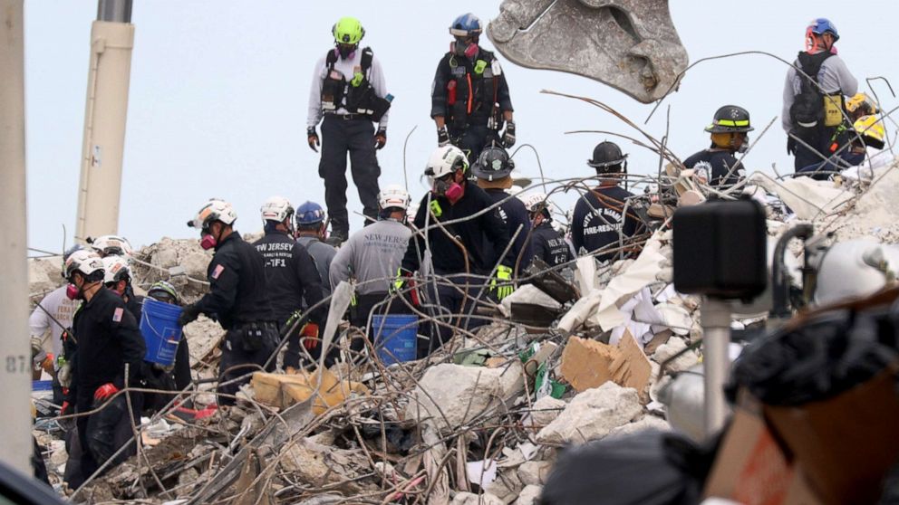 PHOTO: Search teams continue work to recover remains as the search and rescue efforts is reported to be transitioning to a recovery operation in the collapsed 12-story Champlain Towers South condo building on July 7, 2021, in Surfside, Fla.
