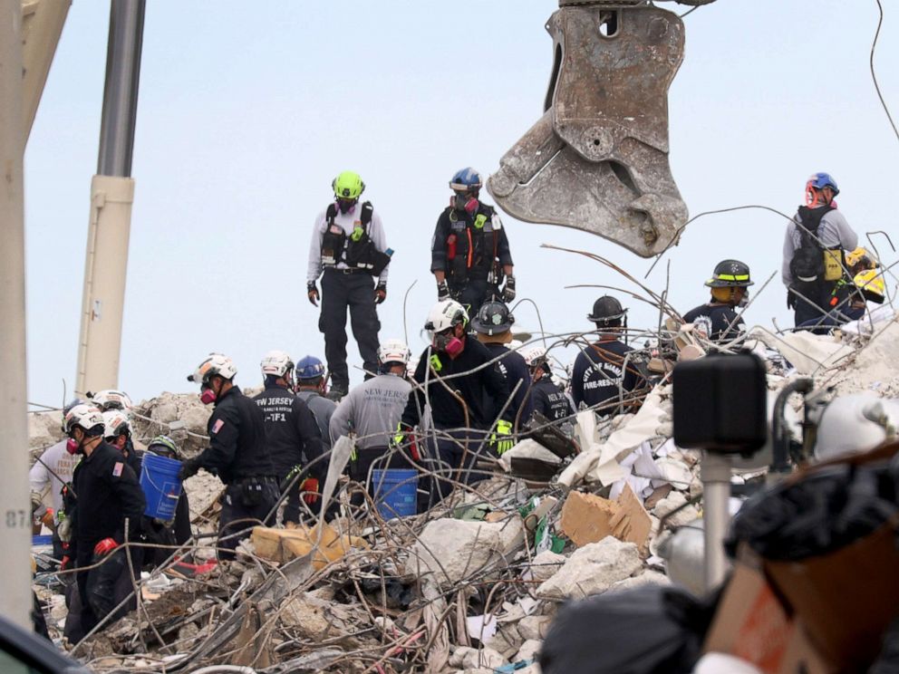 PHOTO: Search teams continue work to recover remains as the search and rescue efforts is reported to be transitioning to a recovery operation in the collapsed 12-story Champlain Towers South condo building on July 7, 2021, in Surfside, Fla.