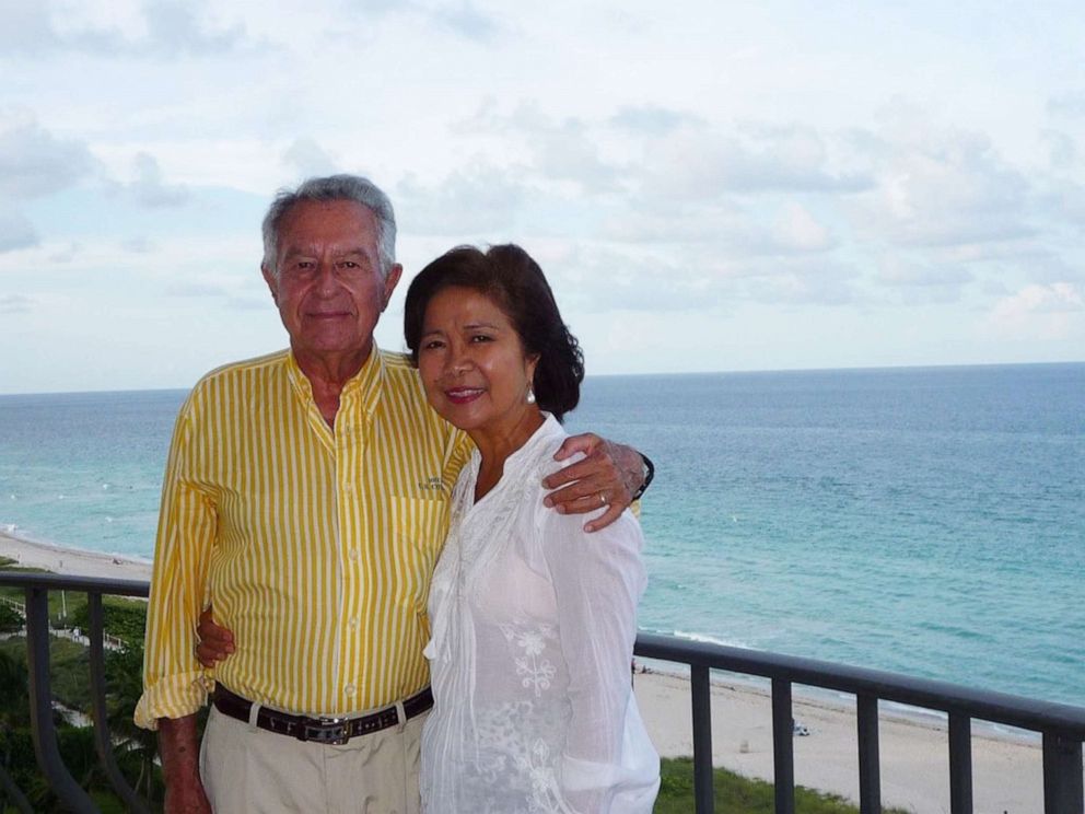 PHOTO: Maria Obias-Bonnefoy and Claudio Bonnefoy pose at their Surfside apartment in an undated photo.