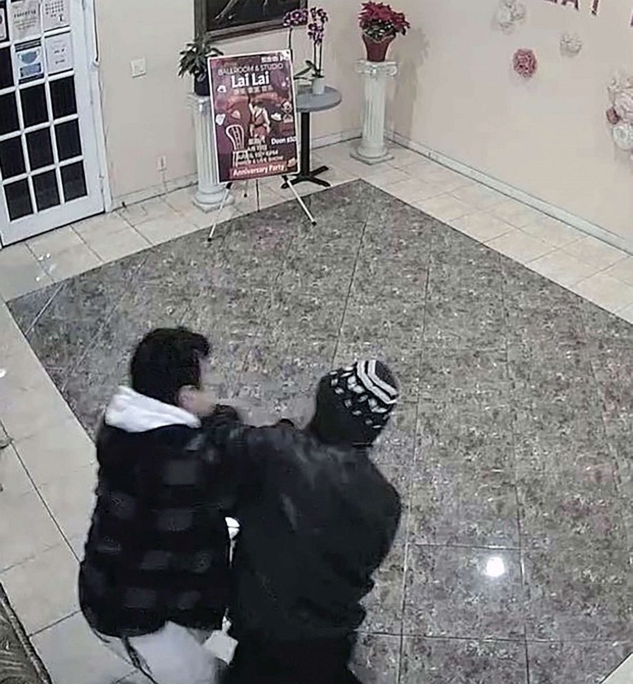 PHOTO: Brandon Tsay is seen in surveillance video wrestling a gun away from Huu Can Tran, 72, who is alleged to have killed 10 people in nearby Monterey Park, in a dance hall in Alhambra, California, on Jan. 21, 2023.