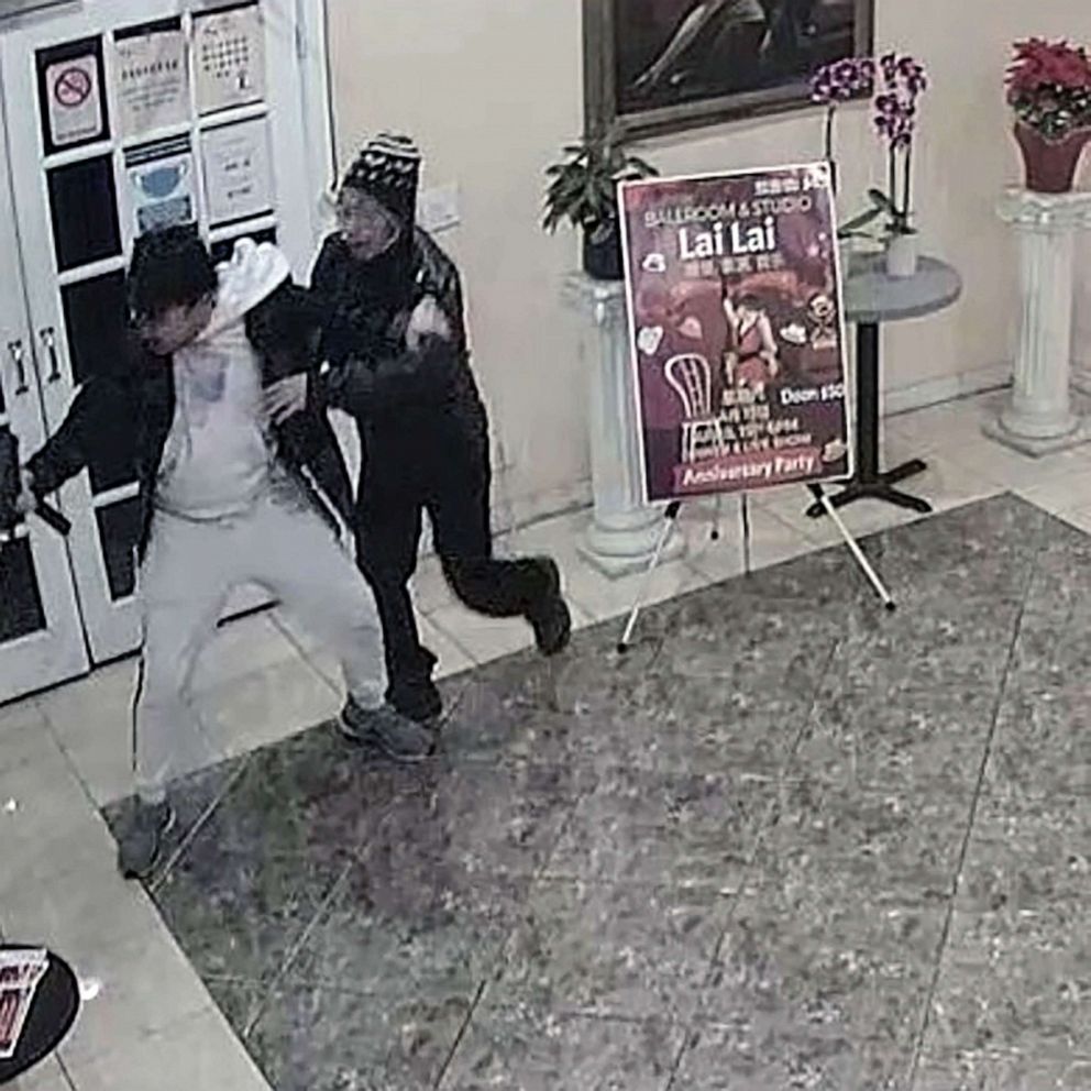 PHOTO: Brandon Tsay is seen in surveillance video wrestling a gun away from Huu Can Tran, 72, who is alleged to have killed 10 people in nearby Monterey Park, in a dance hall in Alhambra, Calif, on Jan. 21, 2023.