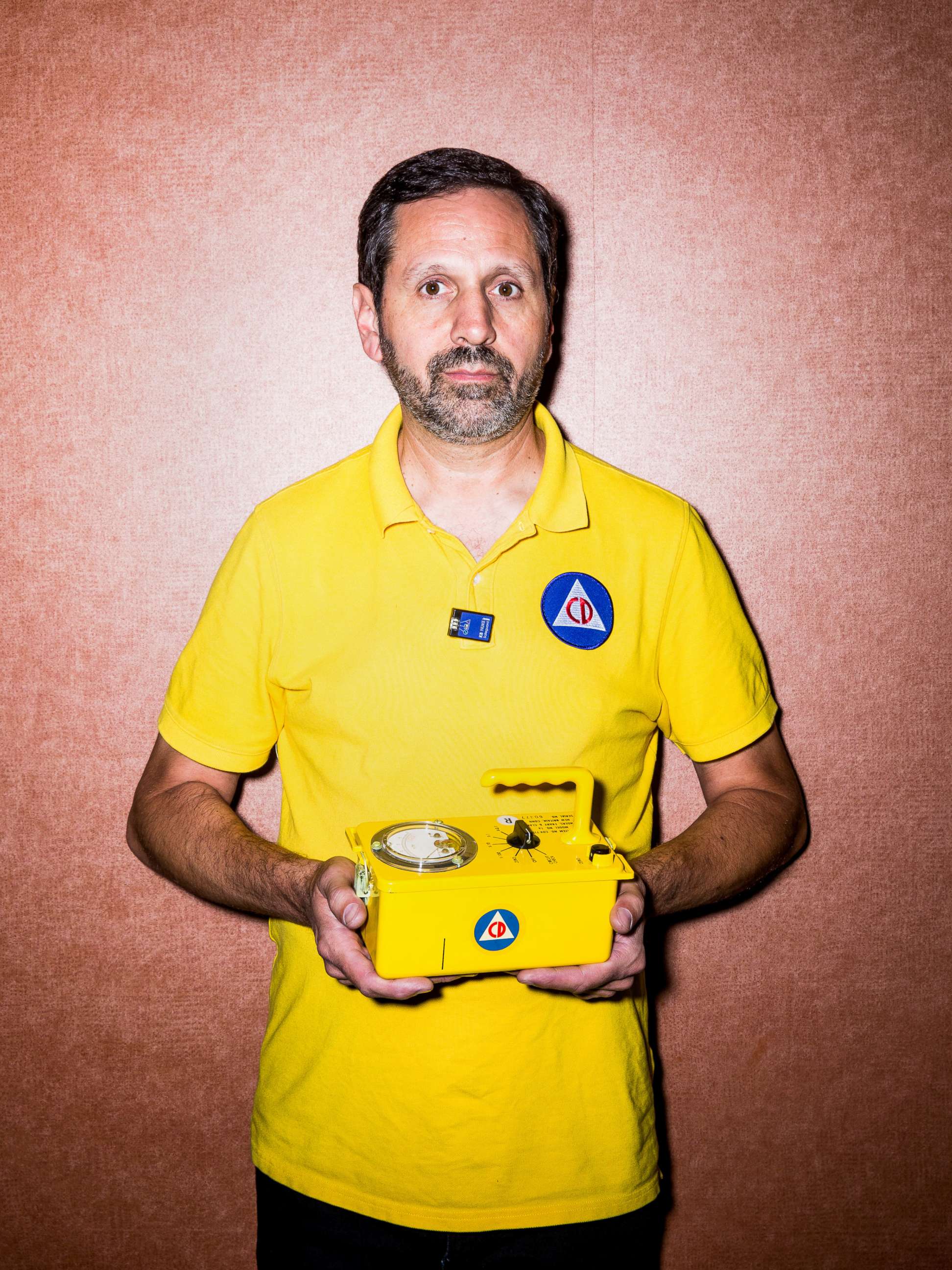 PHOTO: Craig Douglas holds a radiological survey meters, also known as as  Geiger counter, at the expo