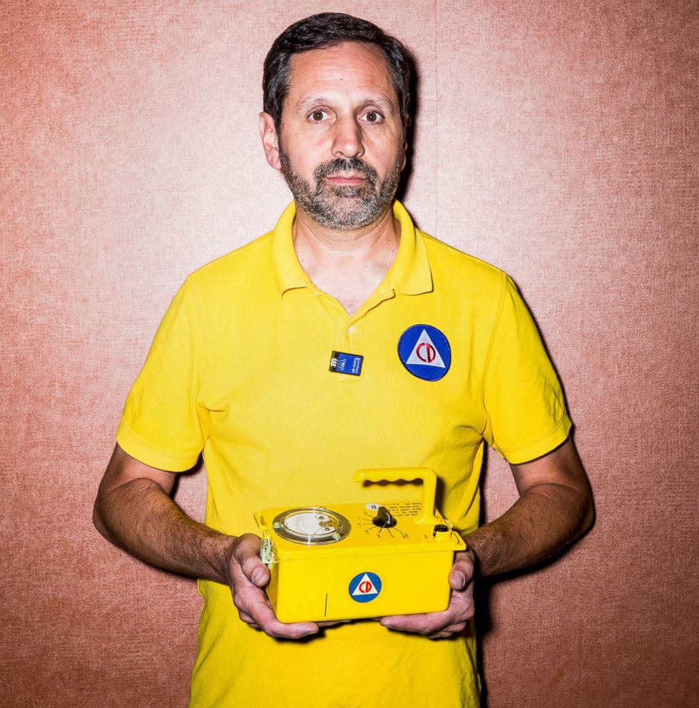 PHOTO: Craig Douglas holds a radiological survey meters, also known as as Geiger counter, at the expo
