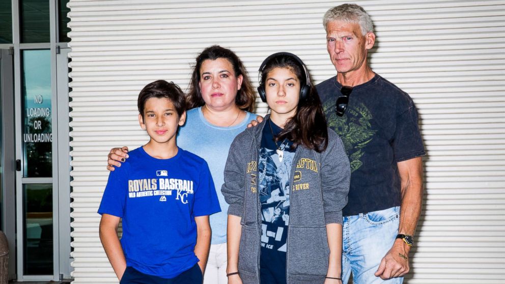 PHOTO: Oliver Montagner, Gladis Gutierrez, Jamely Montagner and John Salmon have their family photo taken during the expo.