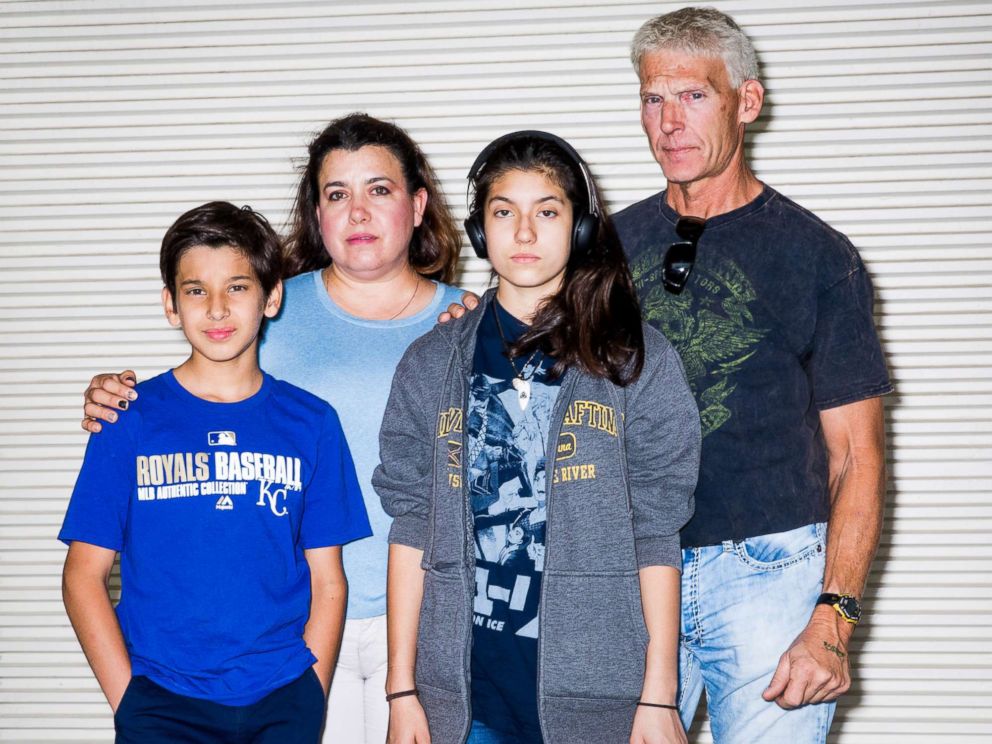 PHOTO: Oliver Montagner, Gladis Gutierrez, Jamely Montagner and John Salmon have their family photo taken during the expo.