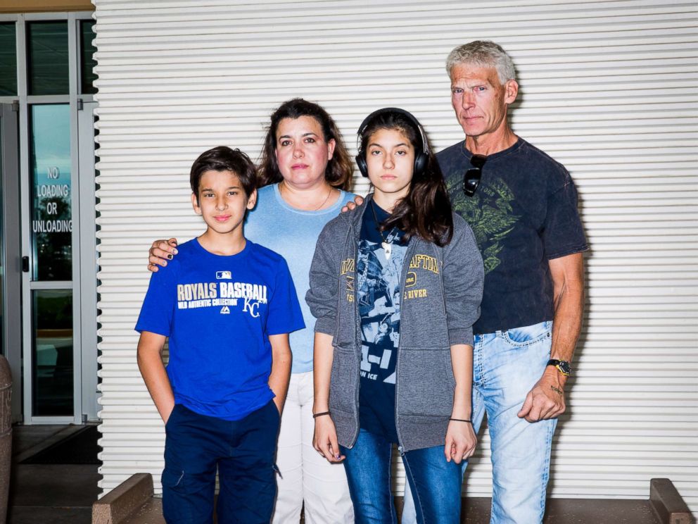 PHOTO: Oliver Montagner, Gladis Gutierrez, Jamely Montagner and John Salmon have their family photo taken during the expo.