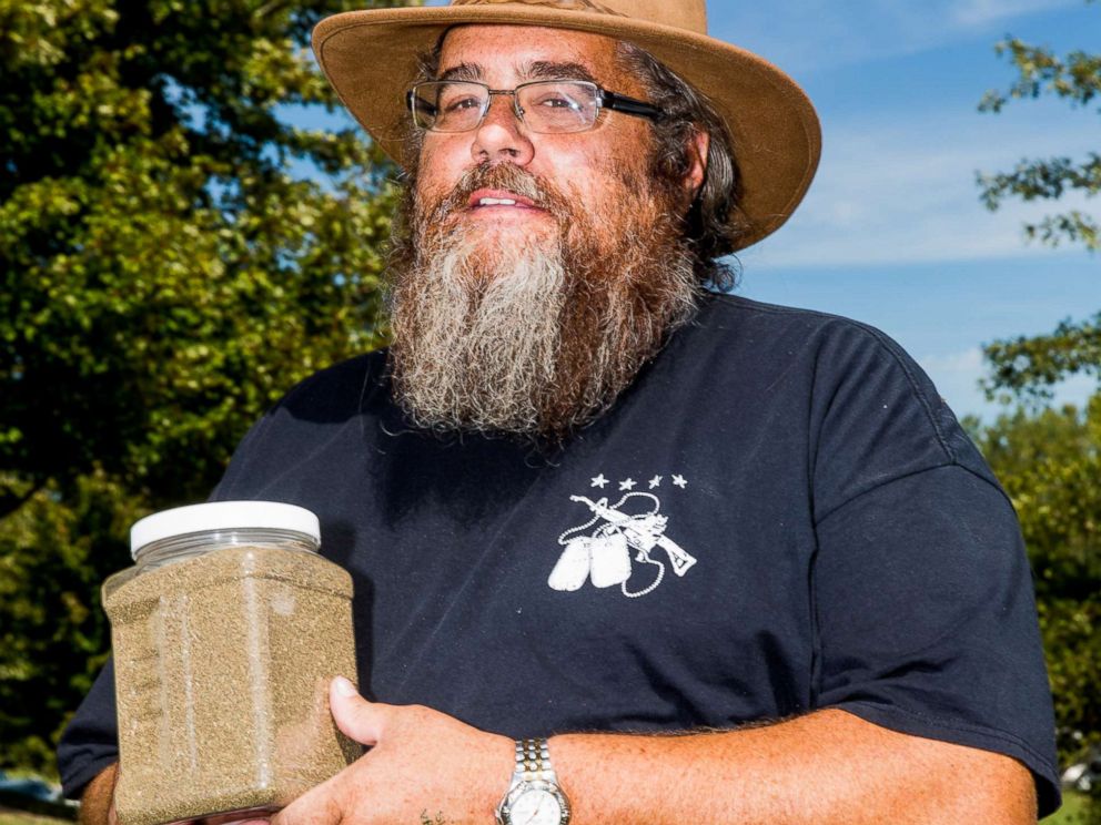 PHOTO: Mark Kemp holds a container of heirloom celery seeds at the Kansas City Survival Expo and Gun Show, Sept. 30, 2017, in Kansas City, Mo.