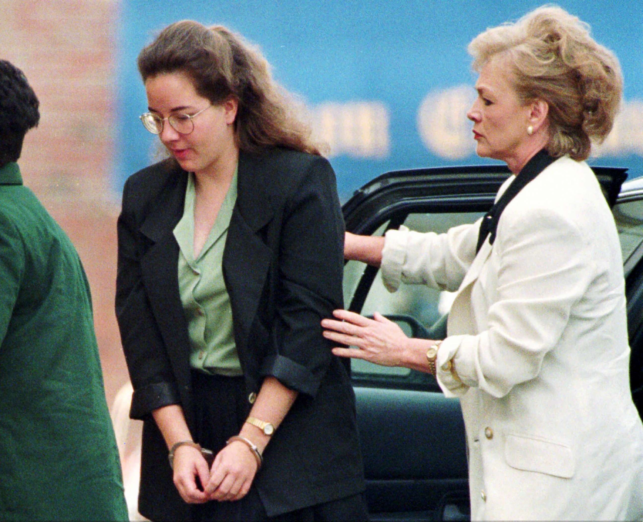 PHOTO: Susan Smith is helped out of  a car as she arrives at the Union County Courthouse in Union, S.C., July 22, 1995.