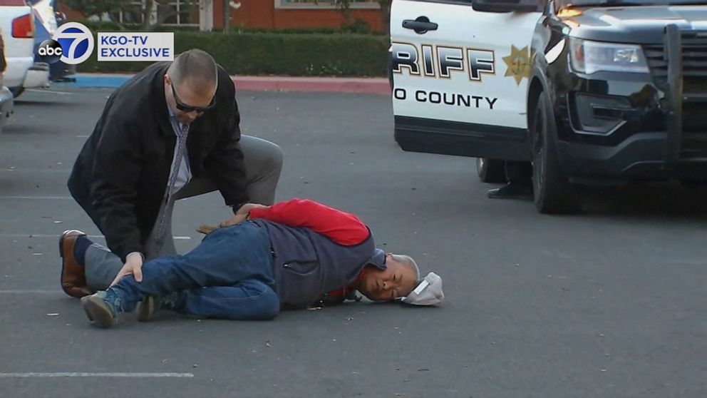 PHOTO: A suspect, Chunli Zhao, is arrested by law enforcement personnel after a mass shooting at two locations in the coastal northern California city of Half Moon Bay, California, Jan. 23, 2023 in a still image from video.
