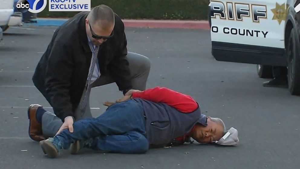 PHOTO: A suspect, Chunli Zhao, is arrested by law enforcement personnel after a mass shooting at two locations in the coastal northern California city of Half Moon Bay, California, Jan. 23, 2023 in a still image from video.