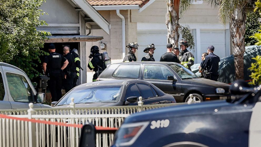 PHOTO: Emergency responders respond to a fire at the house of the suspect of a shooting, May 26, 2021, after multiple people were killed at a rail yard in California's Bay Area.