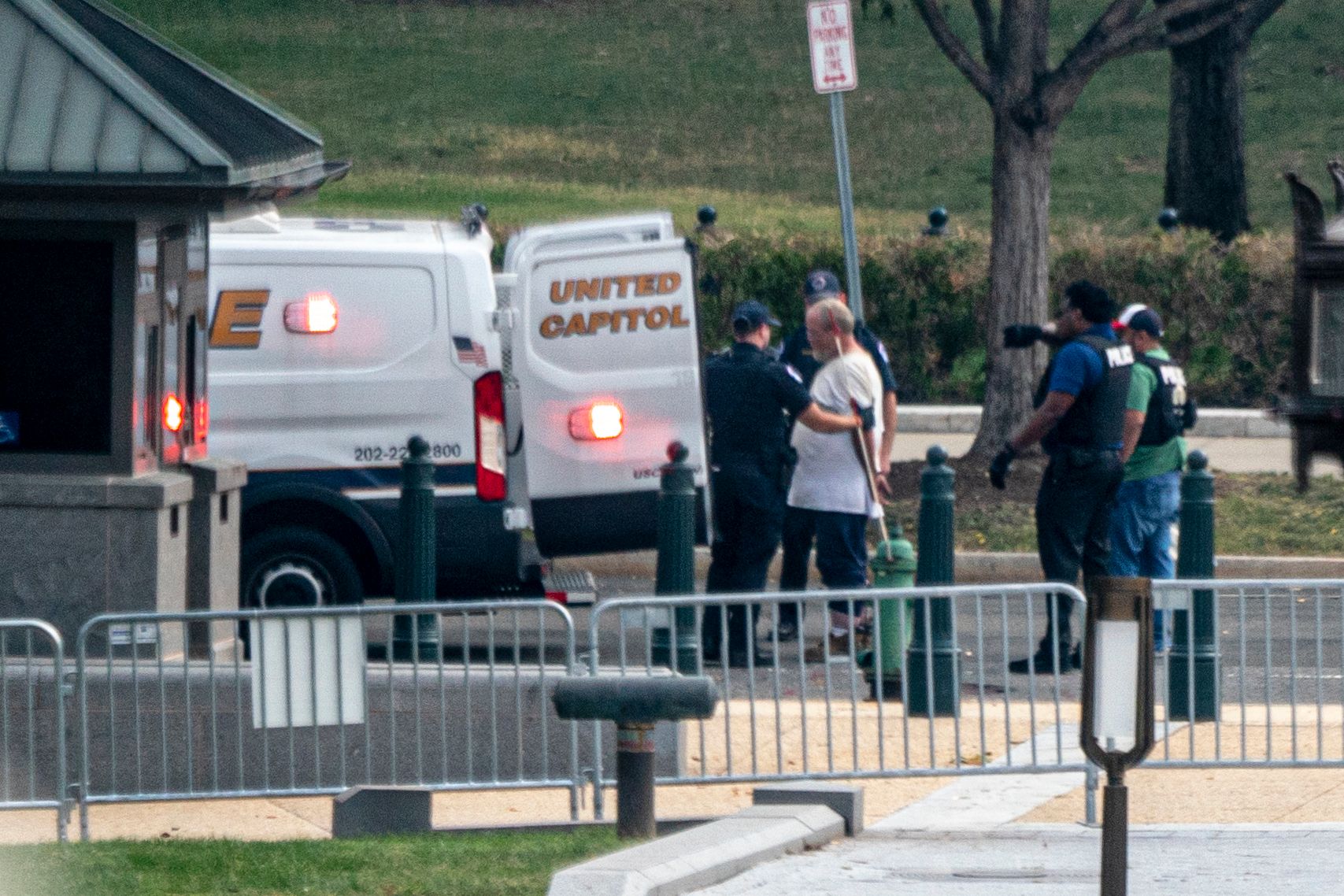 PHOTO: Police take into custody a man who barricaded himself in his vehicle in front of the U.S. Supreme Court Building on Capitol Hill in Washington, D.C., Oct. 5 2021.