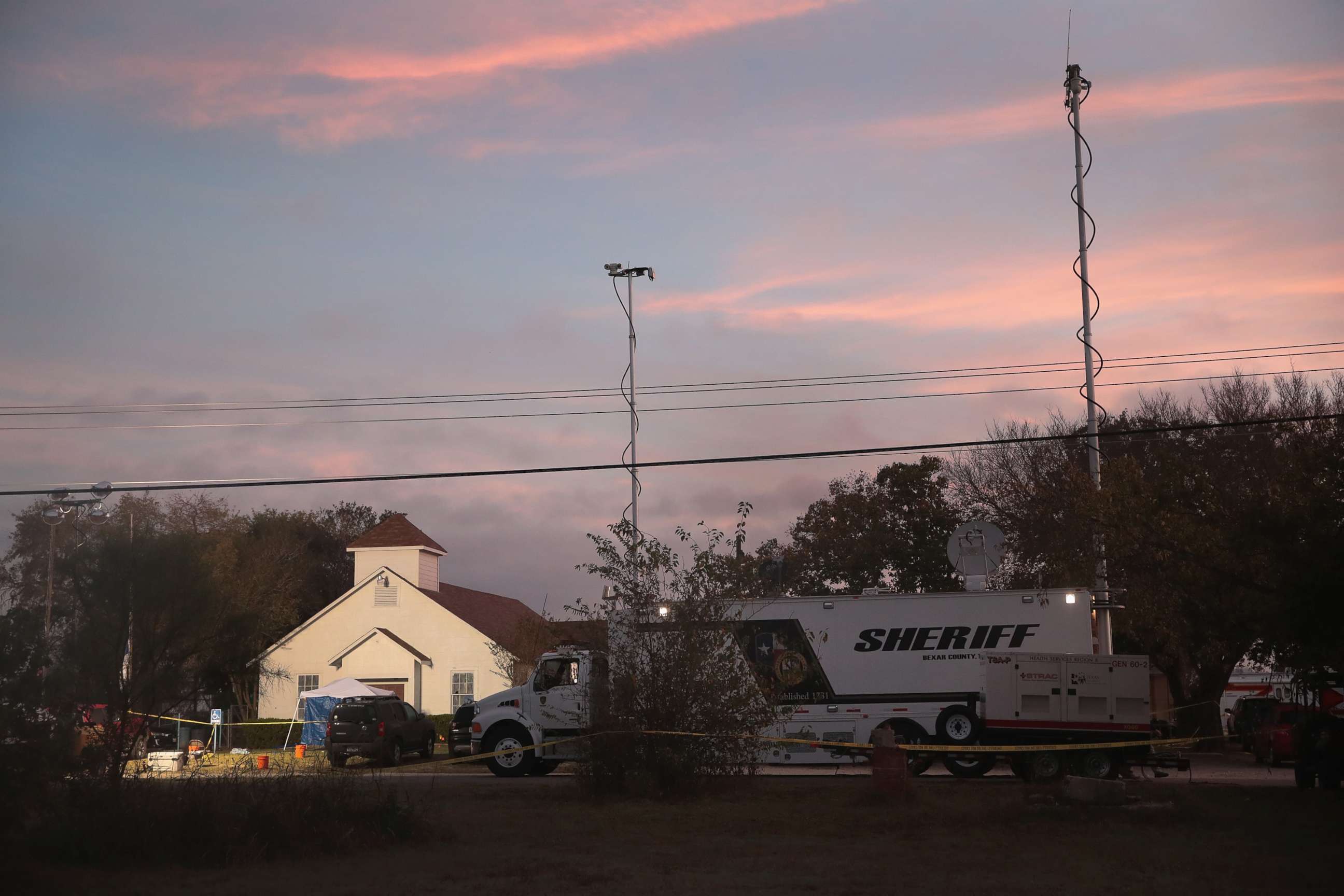 PHOTO: Law enforcement officials continue their investigation at First Baptist Church of Sutherland Springs as the sun begins to rise, Nov. 6, 2017, in Sutherland Springs, Texas. 