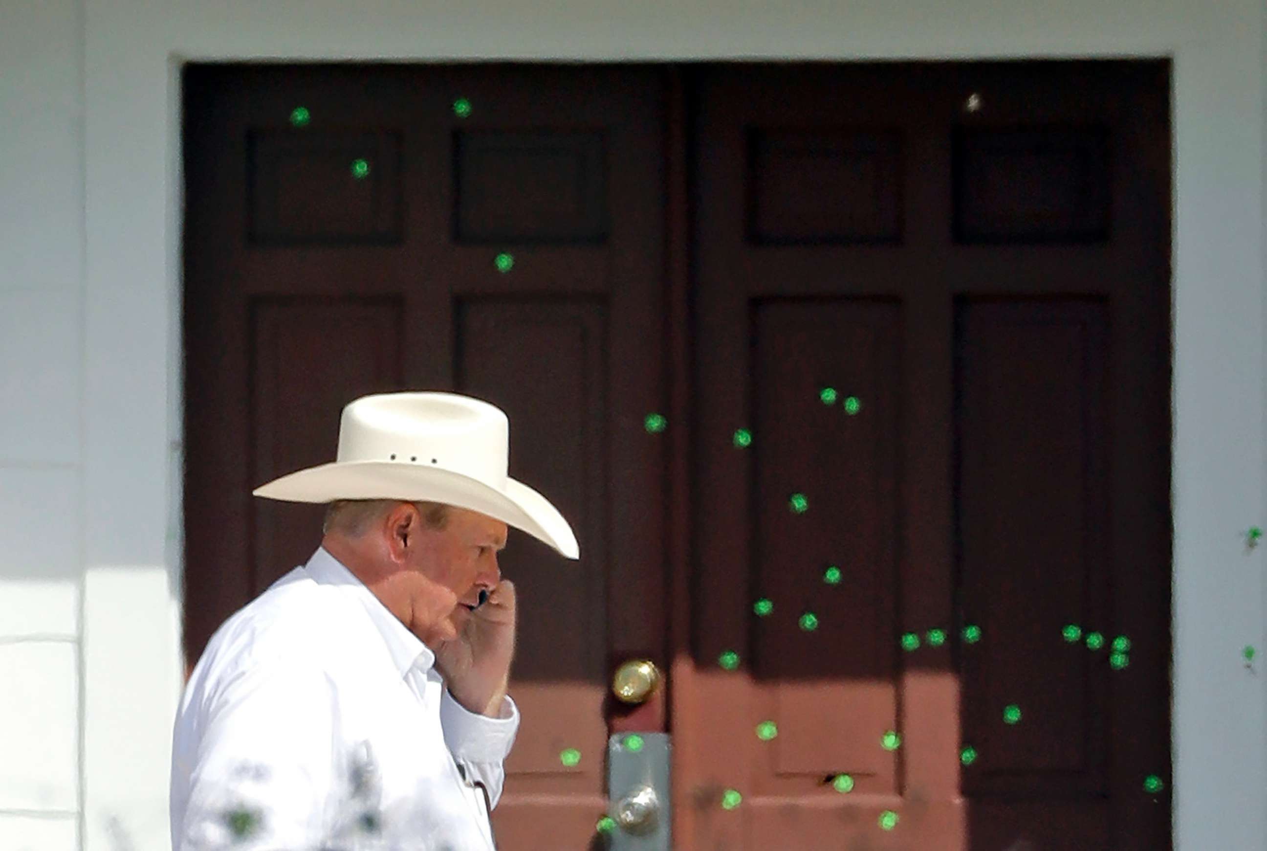 PHOTO: Wilson County Sheriff Joe Tackitt Jr. walks past the front doors where bullet holes were marked by police at the First Baptist Church, Tuesday, Nov. 7, 2017, in Sutherland Springs, Texas. 