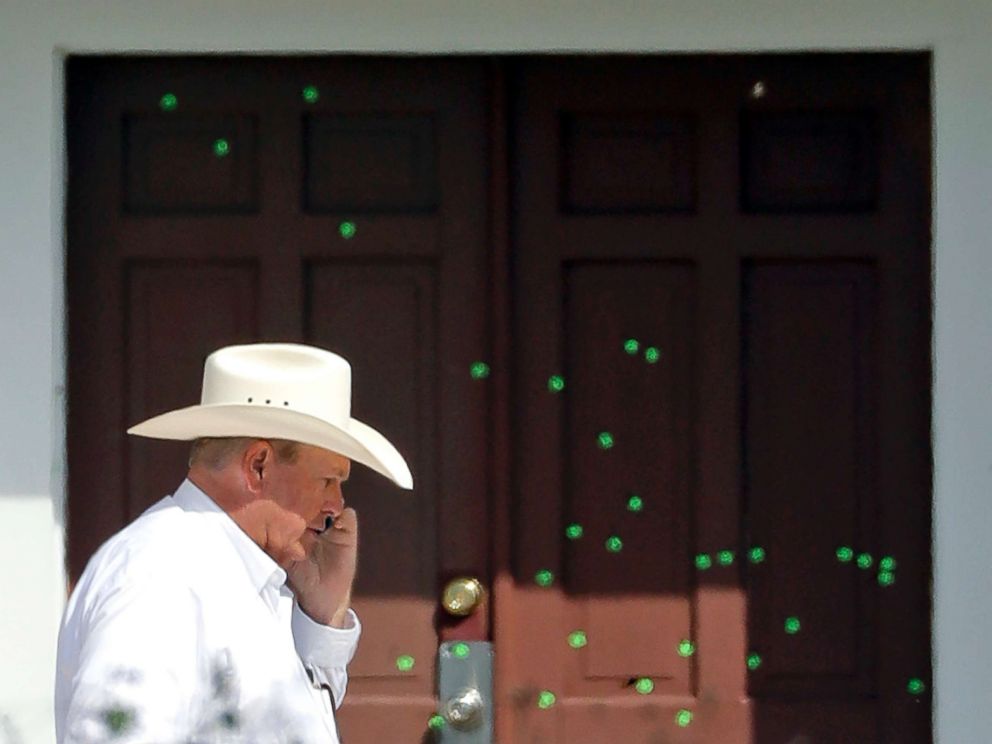 PHOTO: Wilson County Sheriff Joe Tackitt Jr. walks past the front doors where bullet holes were marked by police at the First Baptist Church, Tuesday, Nov. 7, 2017, in Sutherland Springs, Texas.